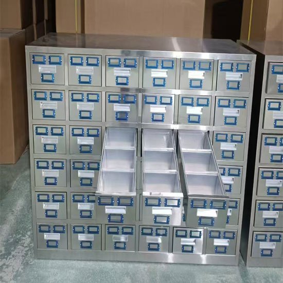 Industrial stainless steel spice cabinet with multiple drawers for professional kitchens.